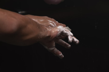 Close-up view of hand scrubbing
