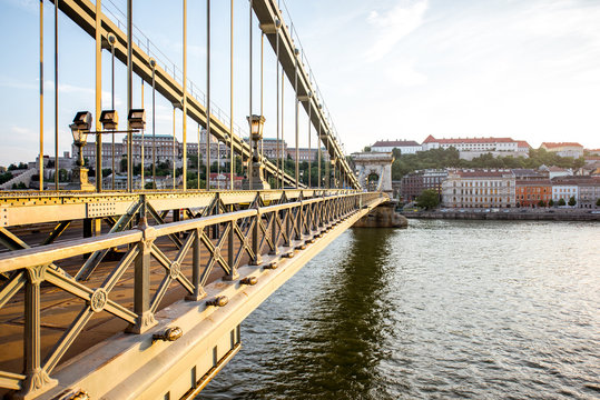 Beautiful cityscape view on the famous Chain bridge on Danube river during the sunset in Budapest city, Hungary
