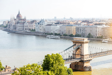 Landscape view on Budapest city with Chain bridge and famous Parliament building during the morning light in Hungary
