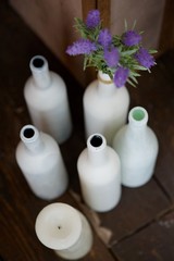 Bottles of wine, painted white as an element of decor in the interior design.