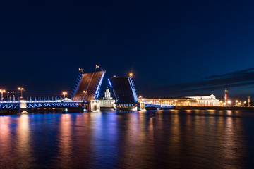 Fototapeta na wymiar Drawn Palace Bridge and back palace view at white night, St Petersburg, Russia