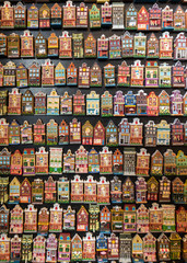 Fototapeta na wymiar Flower market (Bloemenmarkt), fridge magnets depicting facades of Dutch houses. Amsterdam, Netherlands