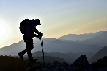 walking in mountains, crossing obstacles and integrating into nature