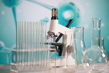 Science laboratory research and development concept. microscope with test tubes