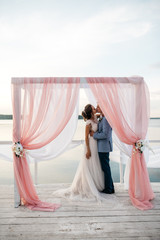 Kiss of the bride and groom outdoor
