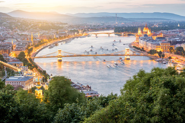 Naklejka premium Aerial landscape view on the illuminated city during the twilight in Budapest, Hungary
