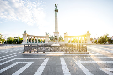 Morning view on the empty Heroes square with monument and column during the sunny weather in Budapest, Hungary - obrazy, fototapety, plakaty