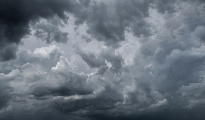 Dark storm clouds before rain used for climate background. Clouds become dark gray before raining. Dramatic background.