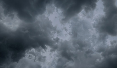 Dark storm clouds before rain used for climate background. Clouds become dark gray before raining. Dramatic background.