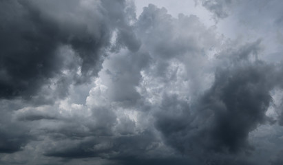 Dark storm clouds before rain used for climate background. Clouds become dark gray before raining. Dramatic background.