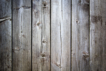 Old grunge dark brown textured wooden background, vertical boards