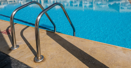 Steel handrails in the pool