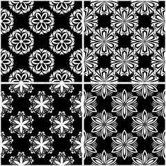 Floral patterns. Set of black and white seamless backgrounds