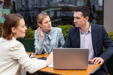 Feeling risks. Blonde-haired smart career woman feeling some risks concerning new business deal