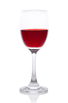 Red wine in a glass isolated on white background