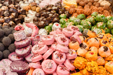 Many colorful delicious sweet candies close-ups at a children's party