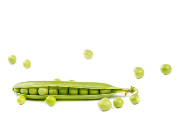 Fruits of green peas on white background.