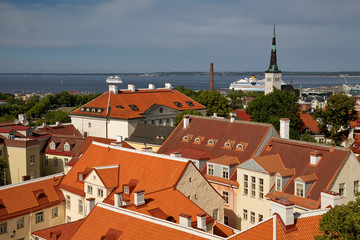 TALLINN, ESTONIA - View from the Bell tower of Dome Church / St. Mary's Cathedral, Toompea hill at The Old Town, St. Olaf's Church, Baltic Sea and cruise ferries