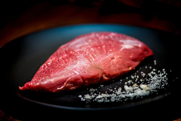 Raw beef fillet with salt