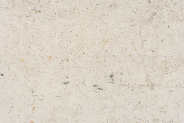 Wall fragment with scratches and cracks