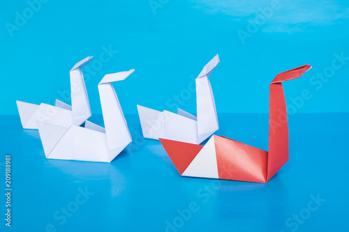 Unique And Leadership Concept Paper Origami Swans On The