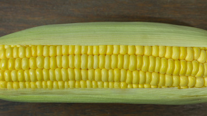 Fresh corn on Table close up image background.