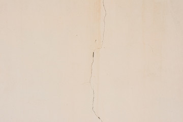 Wall fragment with scratches and cracks