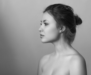 Black and white portrait of a beautiful young woman.