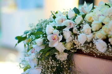 The composition is made by florists from fresh flowers.