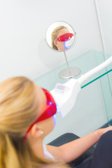 Woman having treatment to the mouth