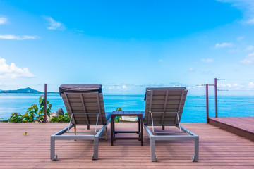 Beautiful tropical sea ocean on blue sky background with bed