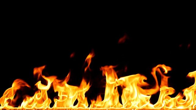 Fire Flames  - Slow Motion.Real flames ignite on a black background. Real fire. Transparent background. PNG + Alpha channel