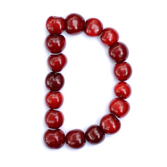 Letter D made with cherries to form a letter of the alphabet. Berry letters on a white background.