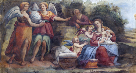 PARMA, ITALY - APRIL 16, 2018: The freso of Holy Family with the angels in church Chiesa di Santa Croce by Giovanni Maria Conti della Camera (1614 - 1670).