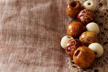  linen background and wooden beads
