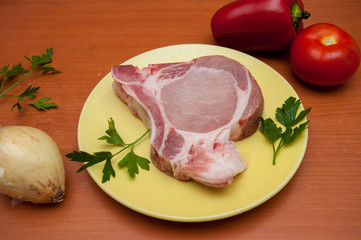 pork for cooking, meat on a plate