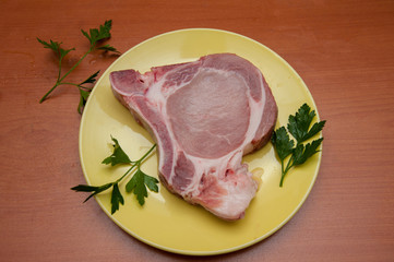 pork for cooking, meat on a plate