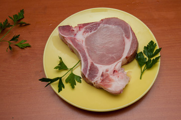 pork for cooking, meat on a plate