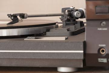 Fototapeta na wymiar Vinyl disc player Concept vintage sound
