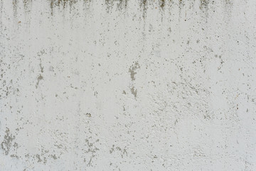 Wall fragment with scratches and cracks