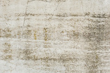Fototapeta premium Wall fragment with scratches and cracks