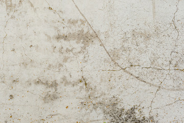 Wall fragment with scratches and cracks