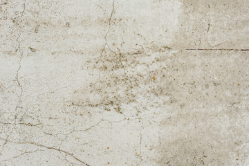 Wall fragment with scratches and cracks