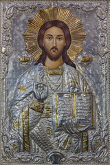 PARMA, ITALY - APRIL 16, 2018: The metalic icon of Jesus the Teacher in church Chiesa di Santa Maria del Quartiere by unknown artist. © Renáta Sedmáková