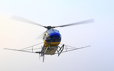 The plane is flying in the air