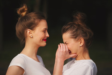 two beautiful girls with red lips