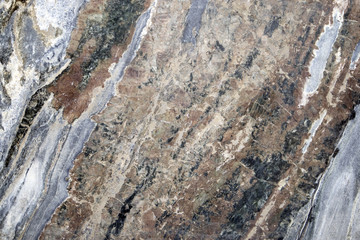 Colorful layered marble texture with different veins, may be used as background