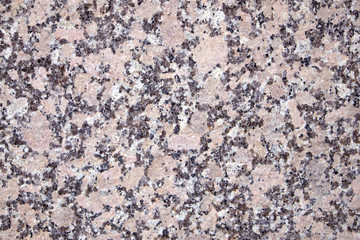 Colorful natural stone texture, smooth granite surface, may be used as background