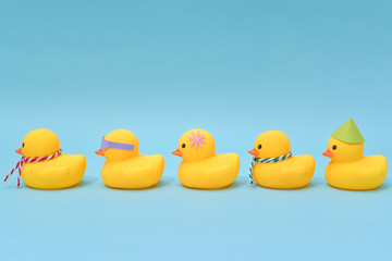 Diversity concept, Difference rubber ducks manage to line up.