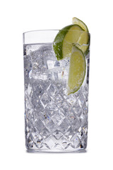 A refreshing gin and tonic coctail in a crystal galsss, shot on white